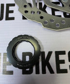 Shimano RT10 disc rotor with Center Lock mount for bicycles.