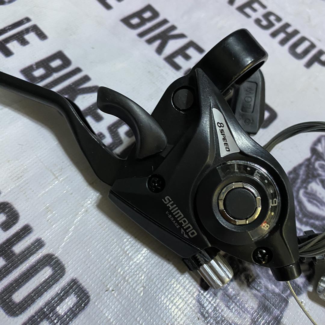 3x8 Shimano integrated shifter and brake for MTB and hybrid bikes.