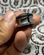 Expander mini plug nut for compressing and securing bike stems.