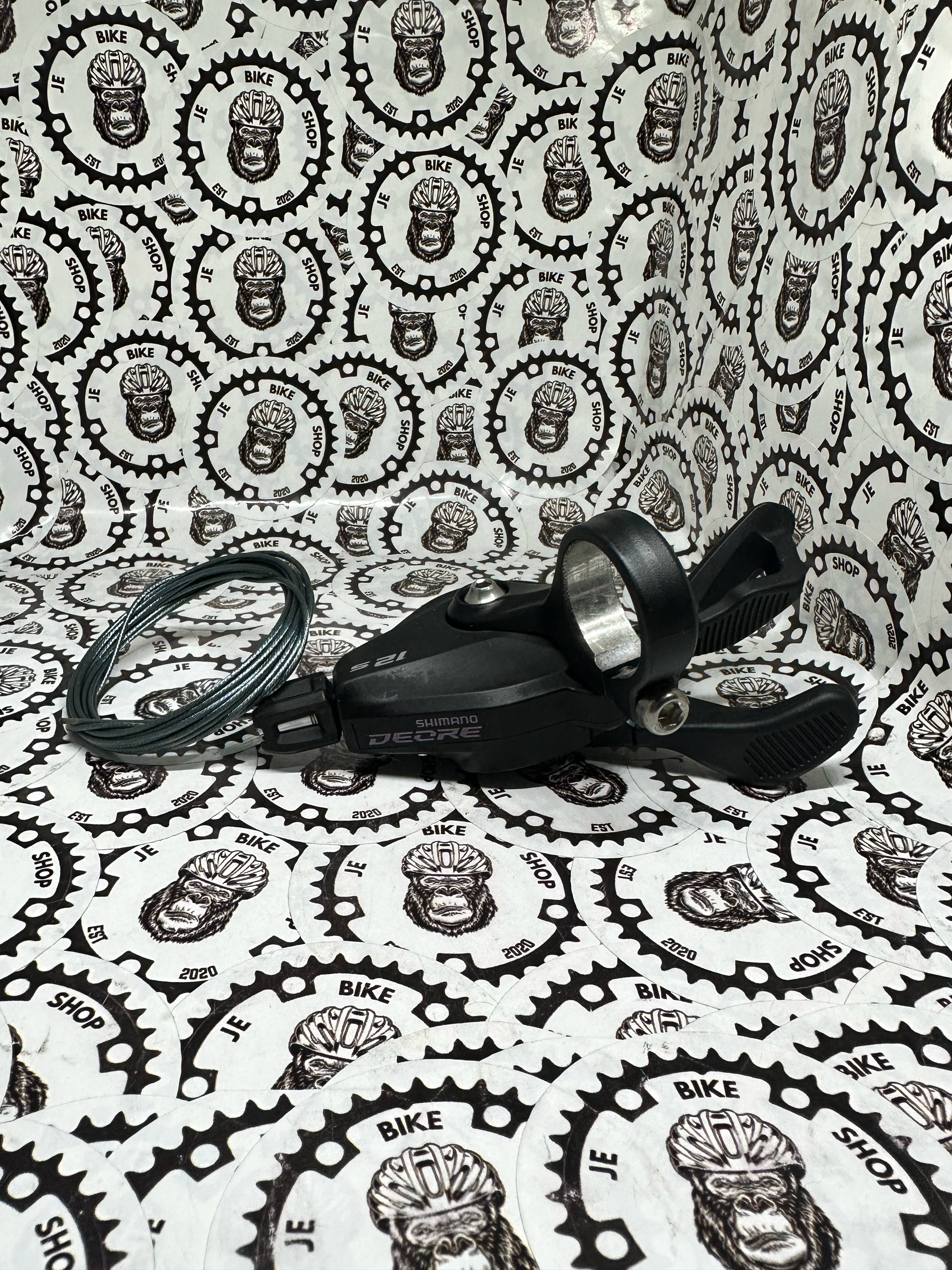 Shimano 51T max Deore M6100 rear derailleur and non-window shifter with cable for 12-speed.