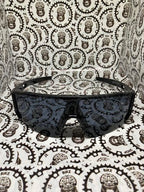 Black cycling eyewear for comfort, protection, and aesthetics