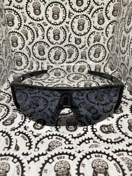 Black cycling eyewear for comfort, protection, and aesthetics