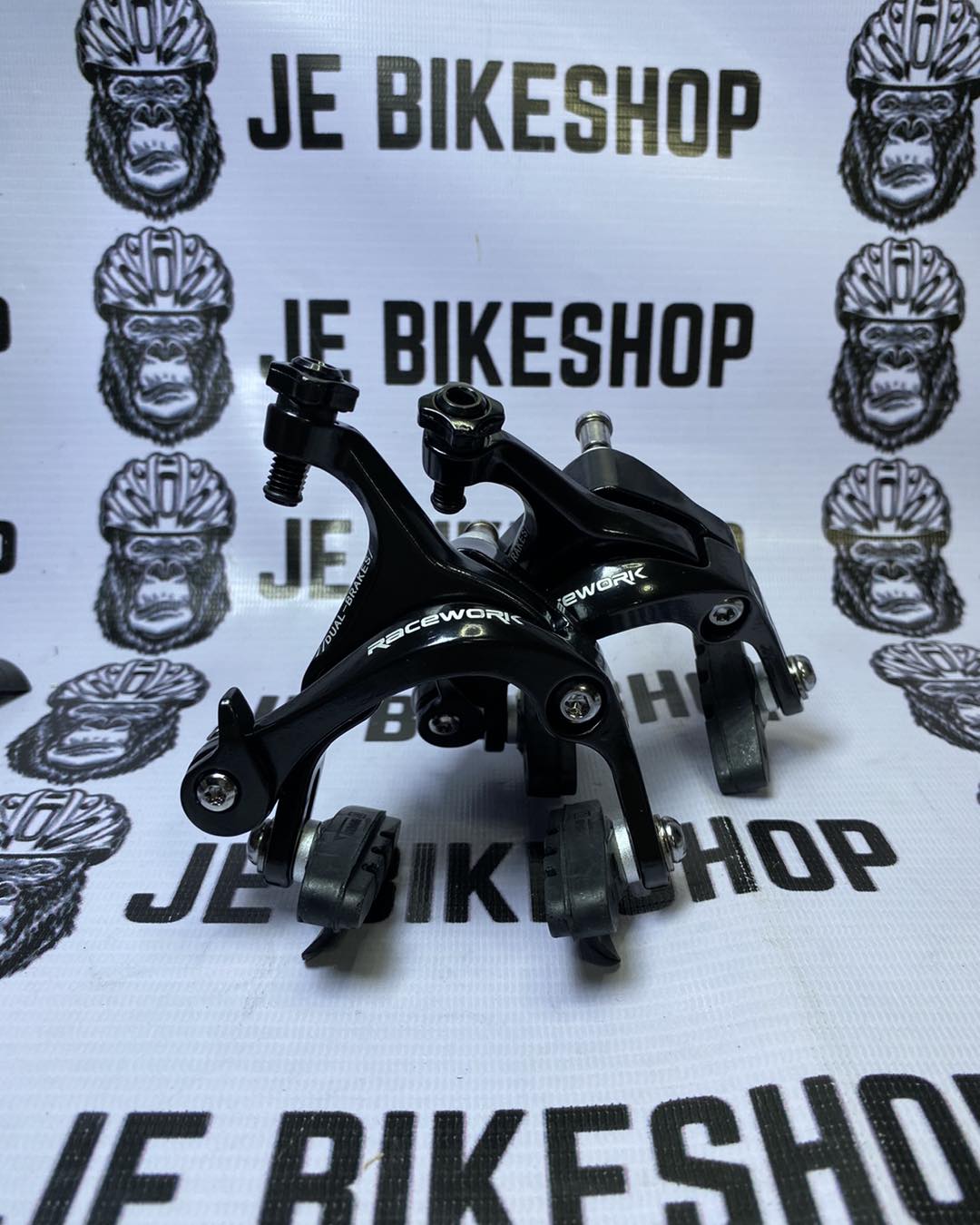 Race Works dual pivot caliper brake pair set for road bikes.