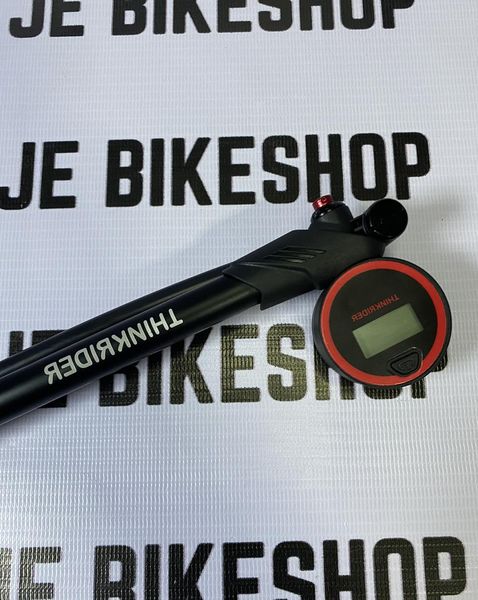 Digital shock pump by Think Rider, accurate PSI/Bar measurement.
