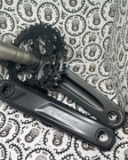 Durable Shimano M4100 36-26T Deore crankset for mountain biking.