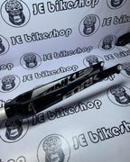 Bicycle fork on a white background with 'JE Bikeshop' branding.