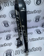 Cycling fork with brand logo on a white background with logos.