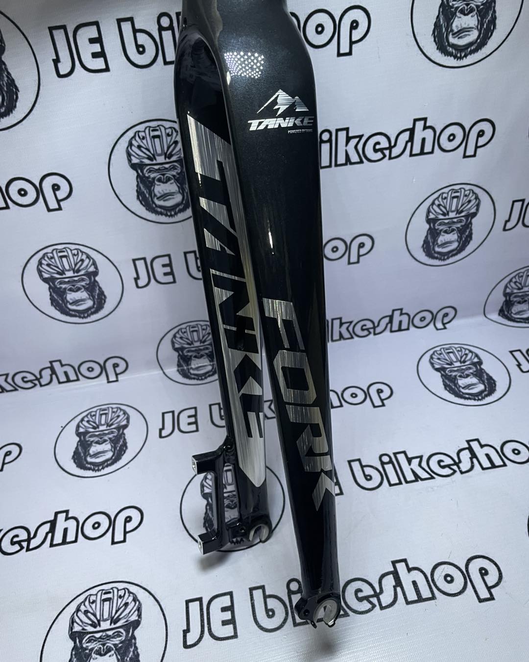 Cycling fork with brand logo on a white background with logos.