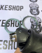 Lightweight Shimano R7000 105 STI shifters for road cycling.