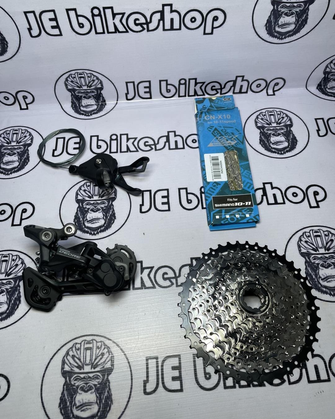 SHIMANO DEORE 10 - 11 S M5120 RD AND M4100 SHIFTER, SHIMANO 10 - 11 S CHAIN WITH 11 - 42 T HENGYANG COGS