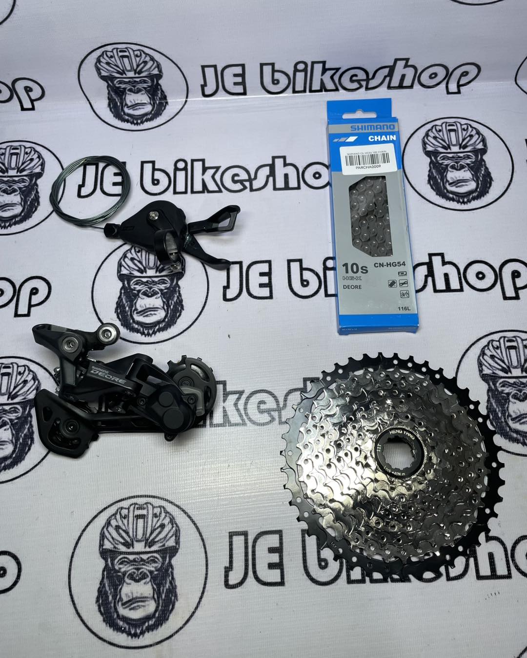 SHIMANO DEORE 10 - 11 S M5120 RD AND M4100 SHIFTER, SHIMANO CN-HG54 CHAIN WITH 11 - 42 T HENGYANG COGS