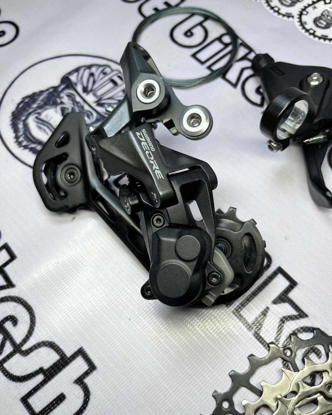 SHIMANO DEORE M5120 10-11 RD AND M5100 SHIFTER WITH SHIMANO 10-11 S CHAIN AND ULTRA LIGHT SUNSHINE 11-42T  COGS