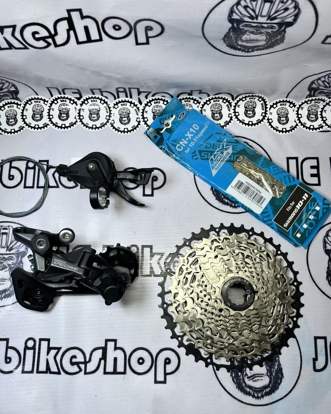 SHIMANO DEORE M5120 10-11 RD AND M5100 SHIFTER WITH SHIMANO 10-11 S CHAIN AND ULTRA LIGHT SUNSHINE 11-42T  COGS