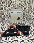 Shimano shifter attachments for road bikes, red, blue, yellow options.