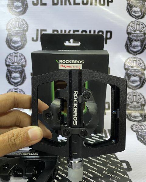 Durable ROCKBROS flat pedals with cleat attachment for mountain bikes.