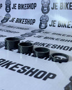 Carbon steerer tube spacer for bike headset adjustment