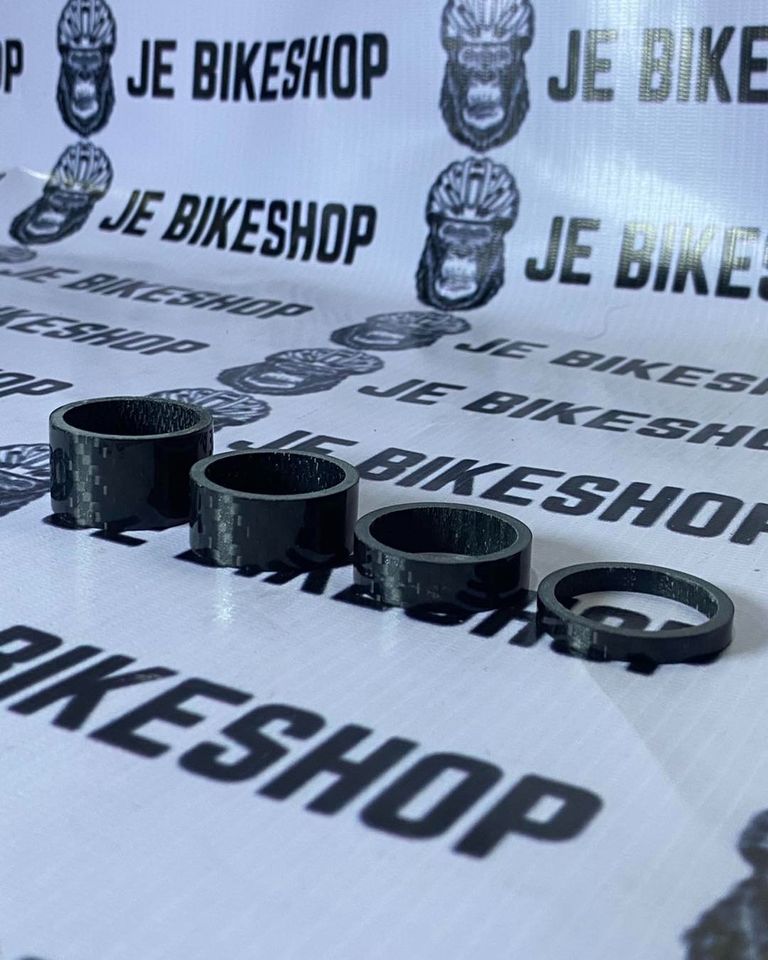 Carbon steerer tube spacer for bike headset adjustment