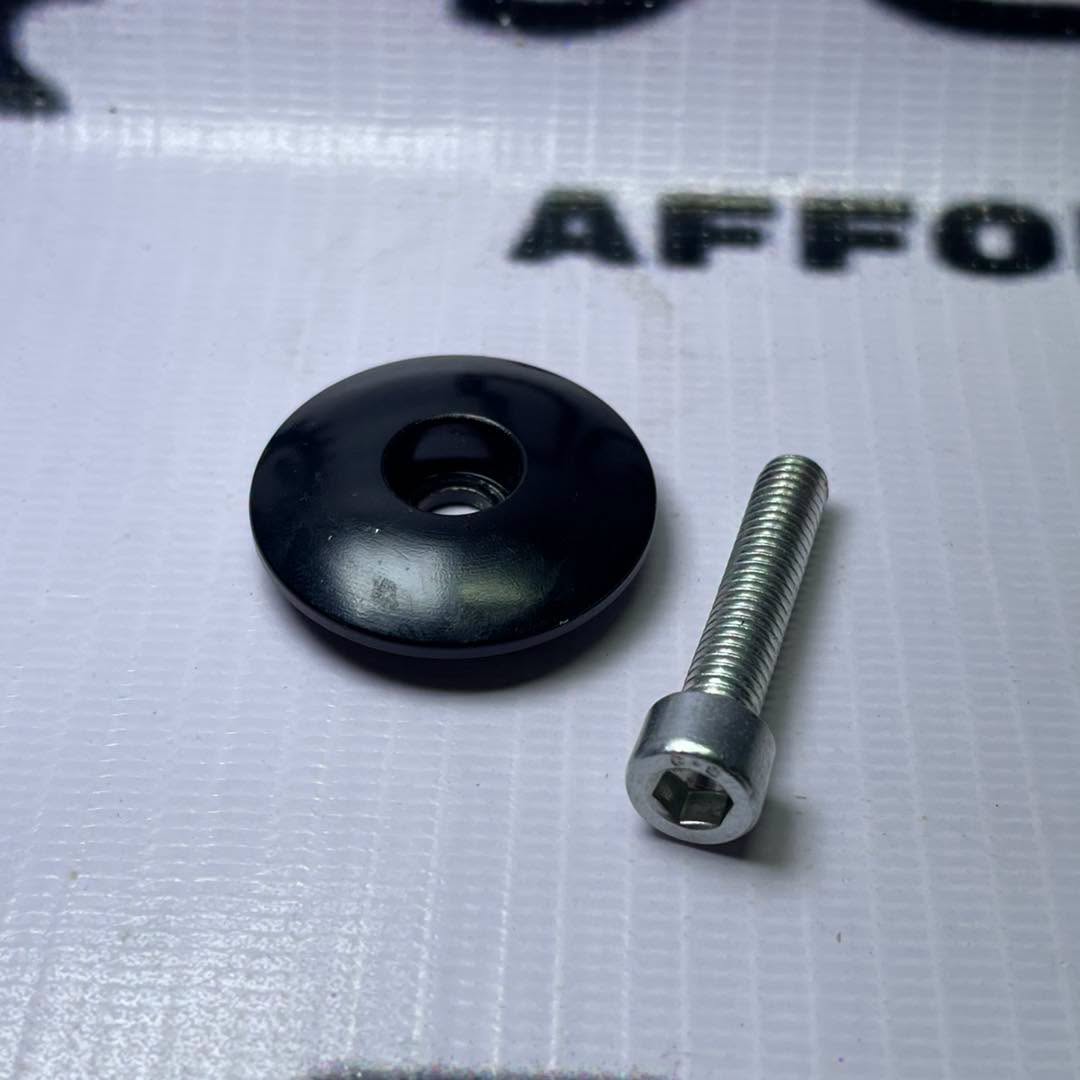 CURVED BLACK TAP CAP WITH STAINLESS BOLT ALUMINUM CAP