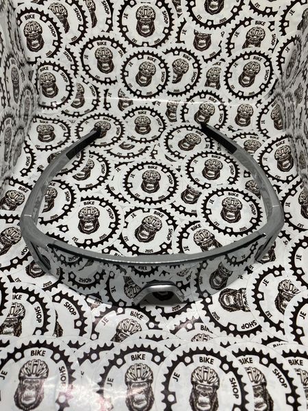 Lightweight silver cycling shades with anti-glare UV lenses.