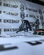 Flexible Oulaiou black cycling glasses with transparent glass.