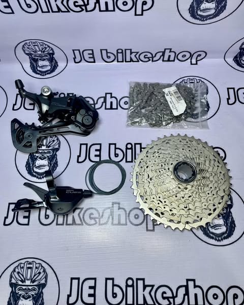 Shimano CUES U6000 SGS 11 speed upkit with HG601 chain and Deore M5100 11-42T cogs
