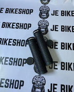 Black and violet Riderace MTB grips with lock-on design