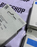 Boxed Shimano SM-SH attachments for precise shifting.