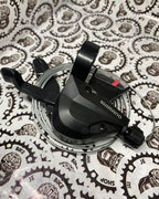 Shimano 8-speed M310 shifter for precise shifting.