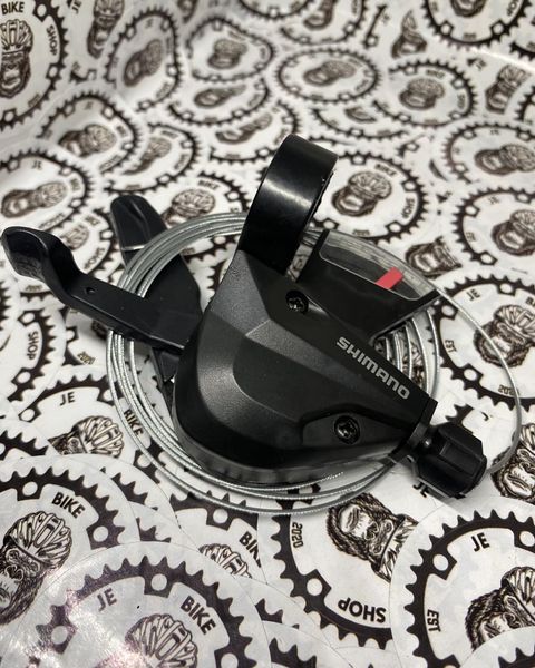 Shimano 8-speed M310 shifter for precise shifting.