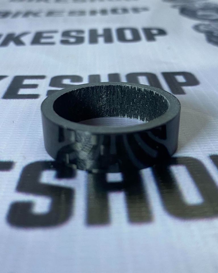 Carbon fiber steerer spacer for stem height fine-tuning