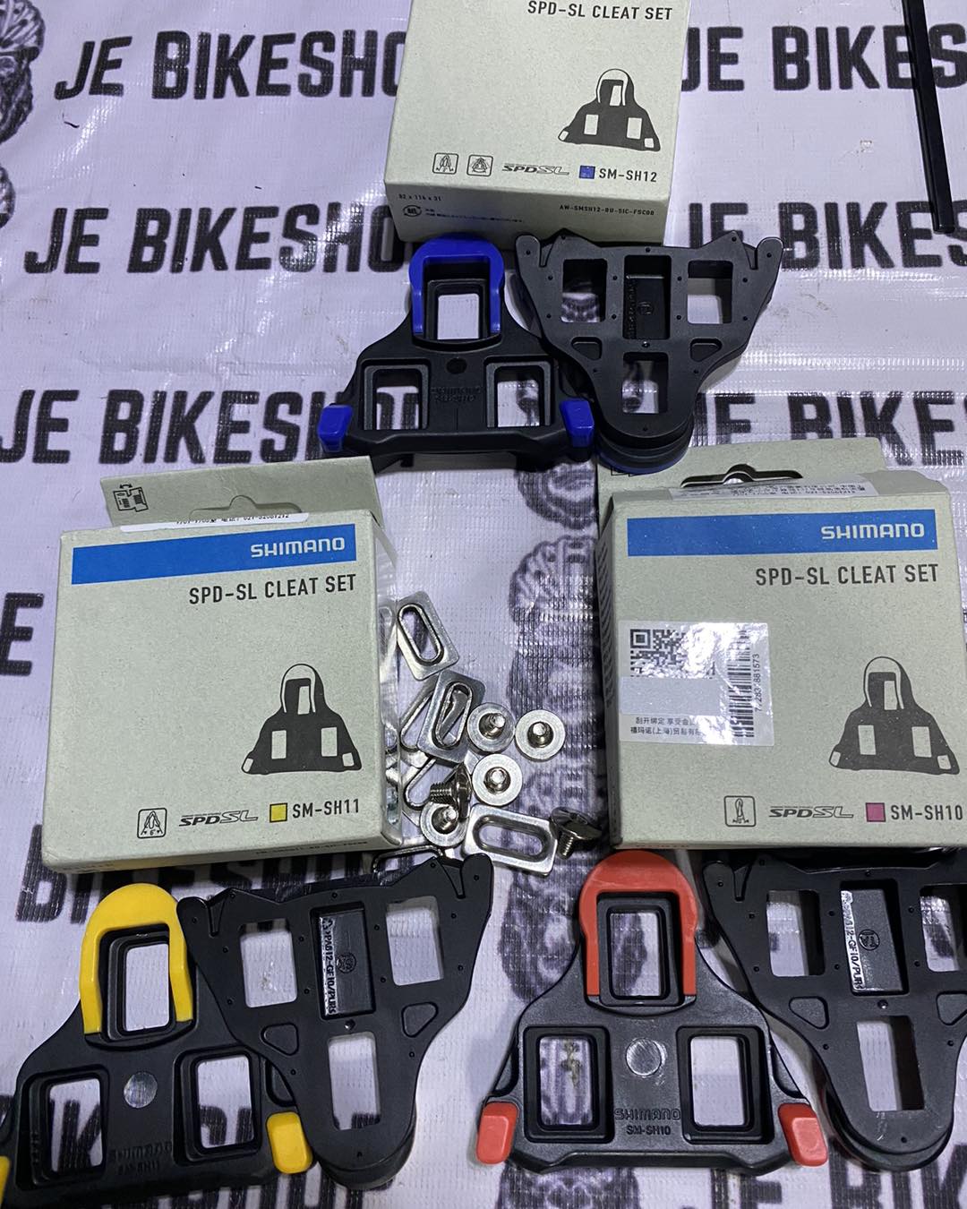 Road bike SM-SH attachments by Shimano, multiple colors.