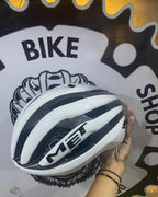 Lightweight MET Trenta cycling helmet, white, medium to large.