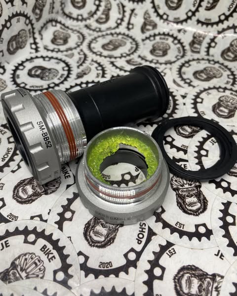 Shimano SM-BB52 bottom bracket for smooth crank rotation.