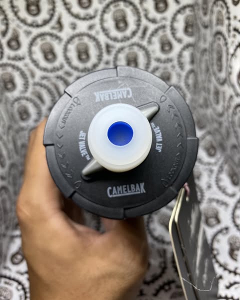 Jet Valve RAPHA x CamelBak cycling water bottle, easy squeeze design.