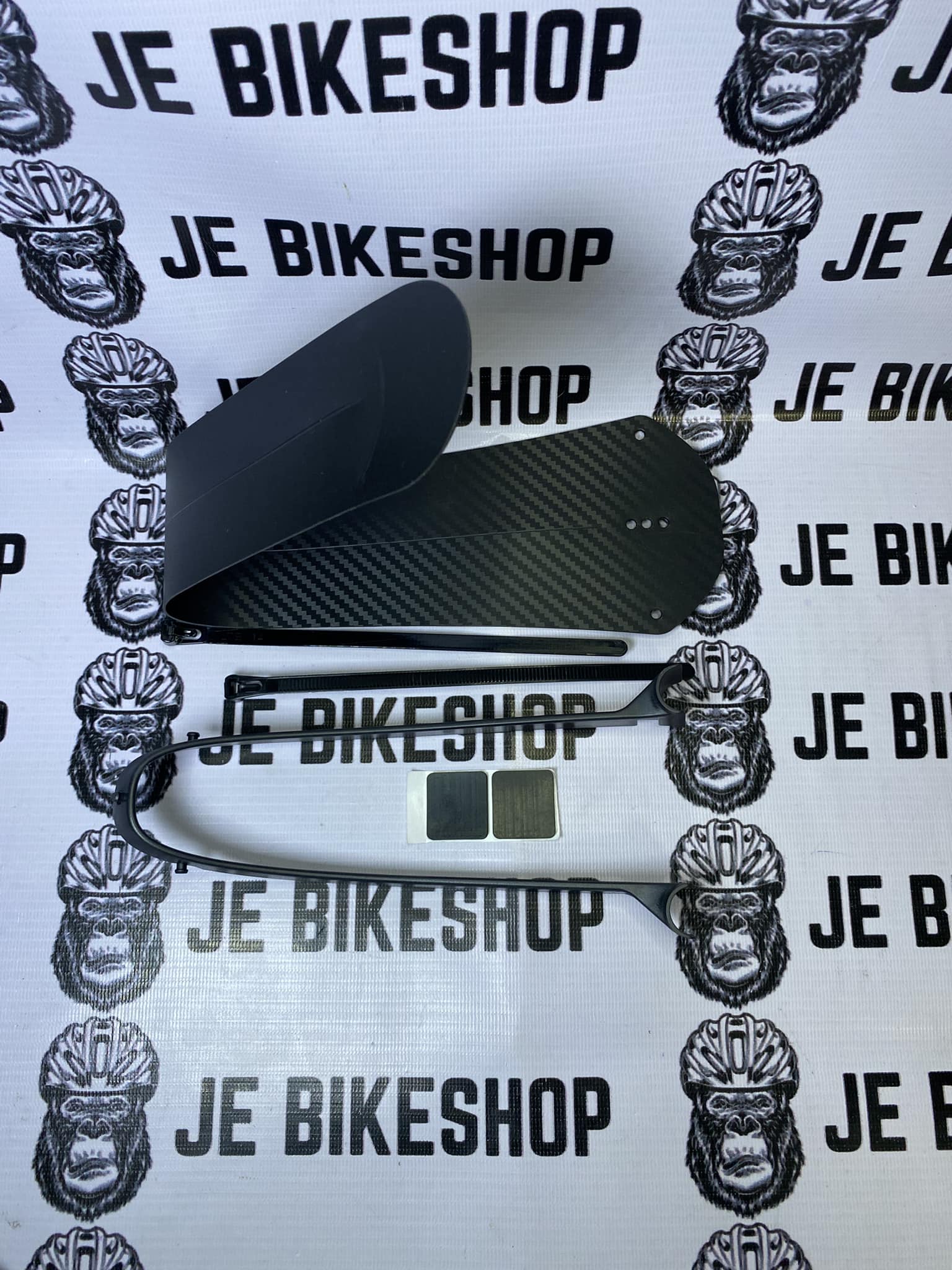 Lightweight bicycle mudguard, foldable design for convenience.