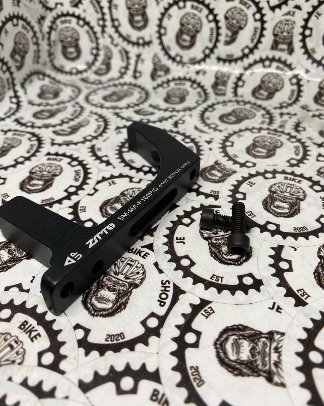 Durable ZTTO disc brake post mount adapter for bikes.