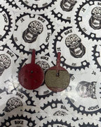 Mechanical B circle-type brake pads for disc brakes.