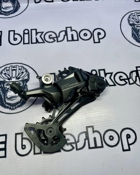 Shimano U6000 11-speed rear derailleur with shifter combo.