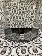 Silver cycling shades with UV protection for outdoor rides.