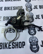 Shimano 3-speed front and 8-speed rear shifter with brake levers.