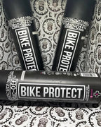 Muc-Off Bike Protect spray to repel dirt, water, and grime.