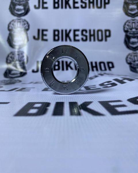 Universal bicycle spoke wrench for wheel truing.