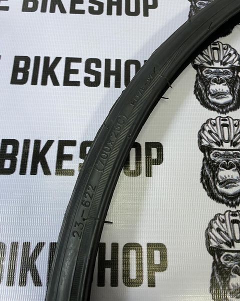 Black Compass 700x23C tire designed for smooth, efficient rides
