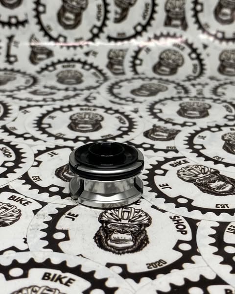 Expander mini compression plug nut for bicycle handlebars and stems.