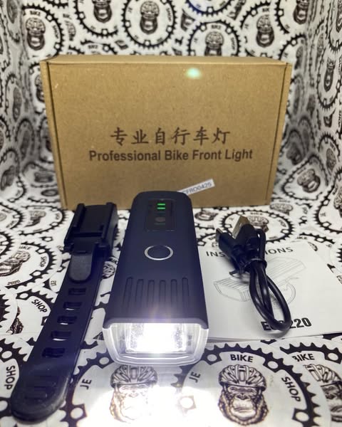 250-lumen waterproof bicycle front light with rubber body and charger box included.