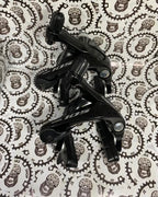 Shimano 105 R7000 dual pivot caliper brakes, sold as pair.