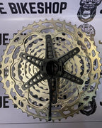 12-speed Shimano Deore M6100 Microspline cogs, 10-51T ratio.