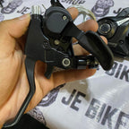 Shimano 3x8 shifter and brake combo with cables included.