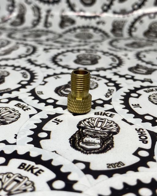 Presta to Schrader valve adaptor for bike tires.