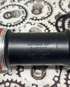 Hollowtech SM-BB52 bottom bracket for MTB and road cranksets.